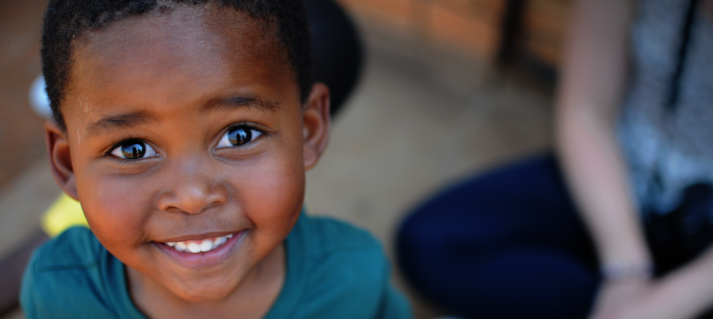 Young boy smiling - Response and Impact